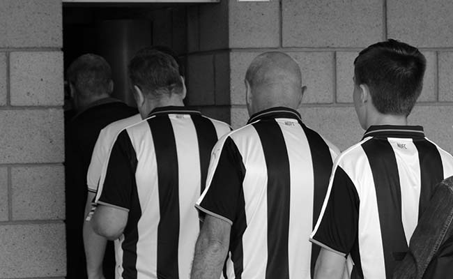 fans entering turnstile sjp newcastle united nufc bw 650x400 1