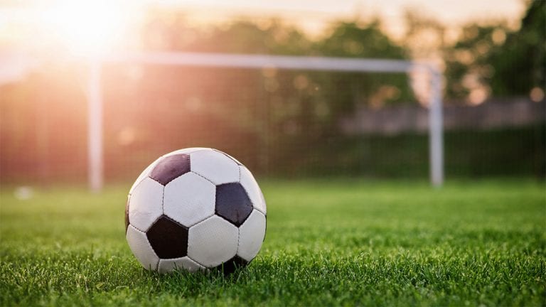 football on grass goalposts sun shining newcastle united nufc 1120 768x432 1
