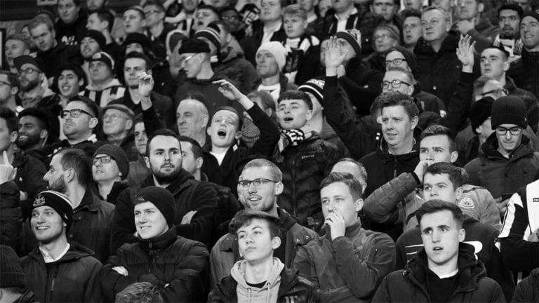 newcastle united fans smiling singing nufc bw 1120 768x432 1