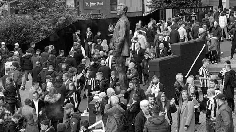 fans outside sjp matchday bobby robson statue newcastle united nufc bw 1120 768x432 1