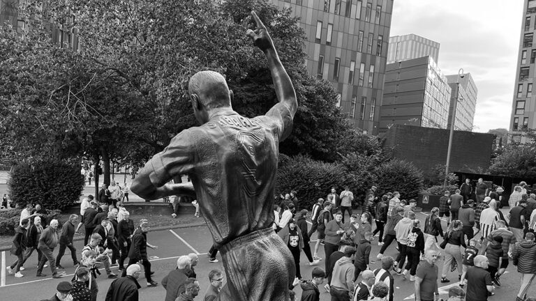 fans walking past alan shearer statue matchday sjp newcastle united nufc bw 1120 768x432 1