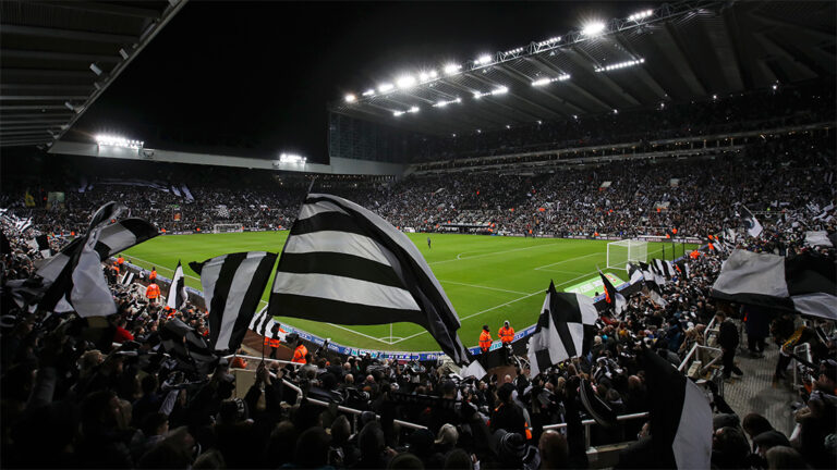 flag waving fans before game night match sjp newcastle united nufc 1120 768x432 1