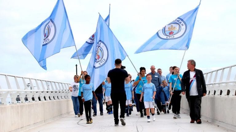 manchester city fans on bridge with fans newcastle united nufc 1024 768x432 1