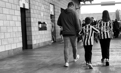 young fans outside gallowgate turnstiles matchday sjp newcastle united nufc bw 1120 768x432 1