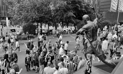 fans looking up at alan shearer statue matchday sjp newcastle united nufc bw 1120 768x432 2